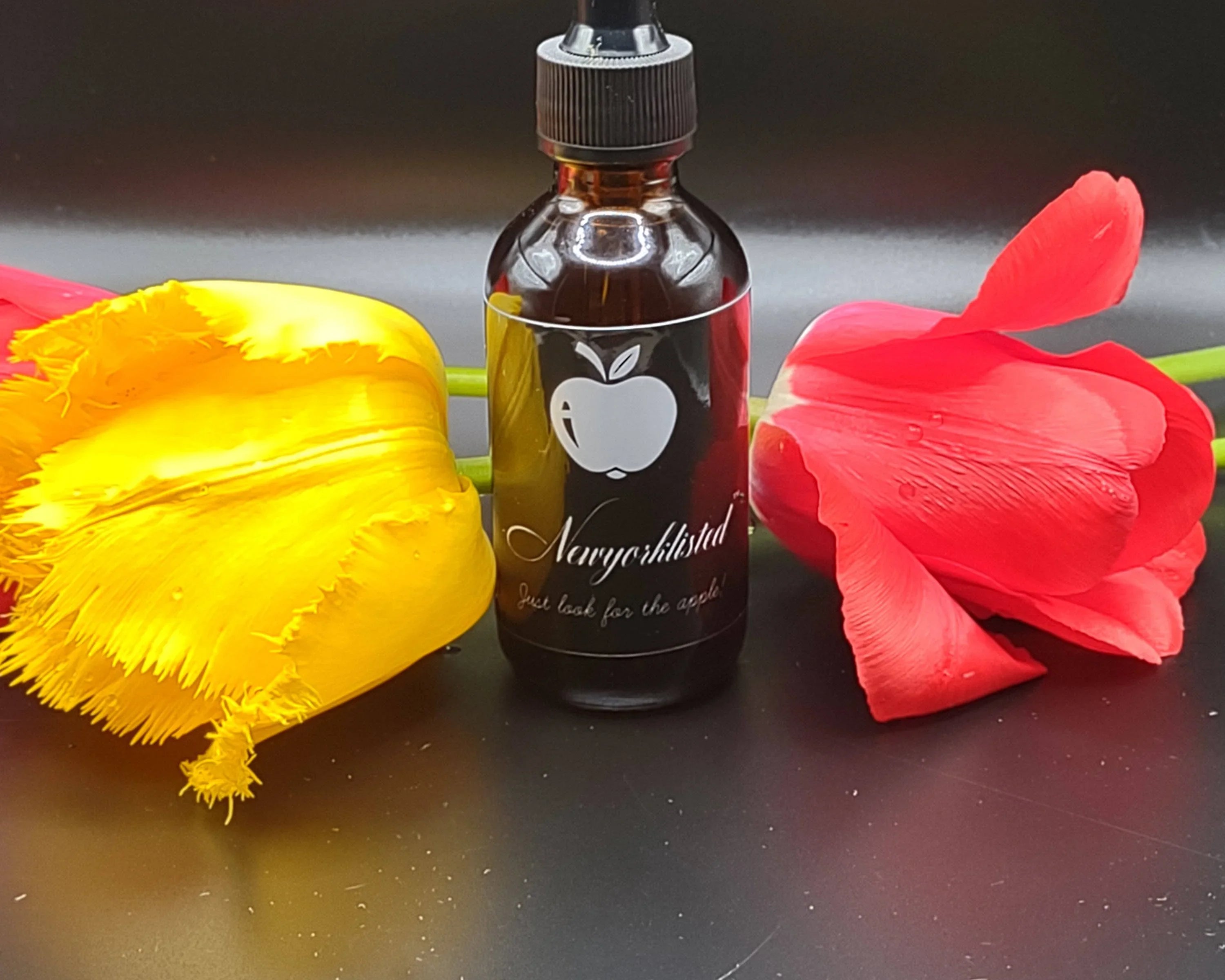 NEWYORKLISTED Organic Essential Oil in a 4ox glass dropper vial