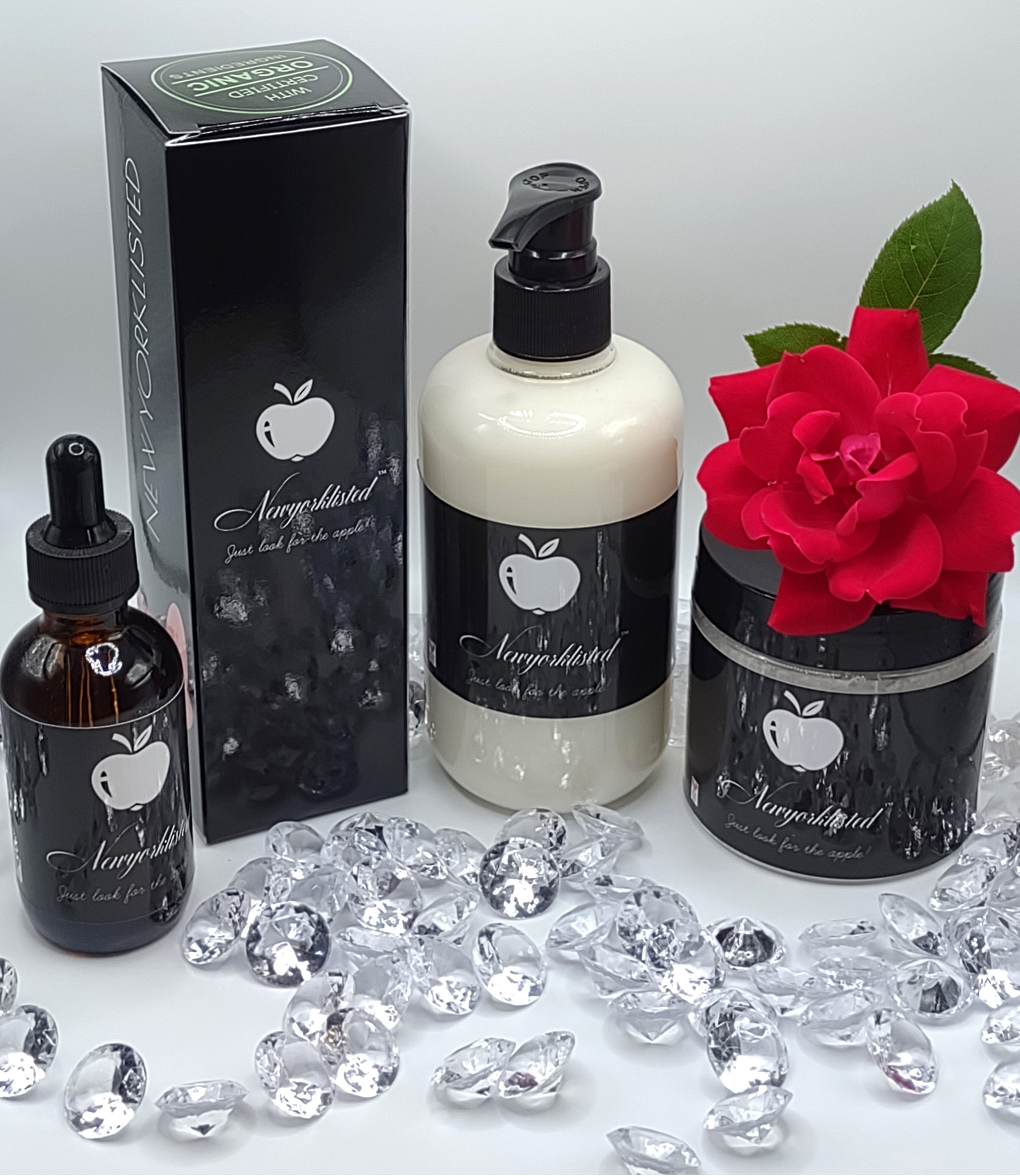 NEWYORKLISTED DIAMOND SPA COLLECTION products of essential oils, body lotion, body scrub, and body wash with NEWYORKLISTED logo
