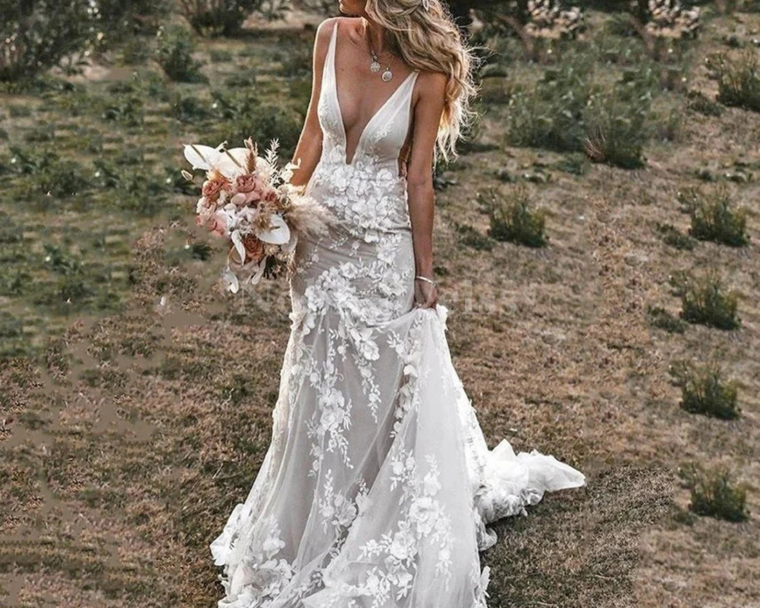 NEWYORKLISTED Elegant Bride Collection: Woman in a white lace wedding dress holding a bouquet in a desert setting
