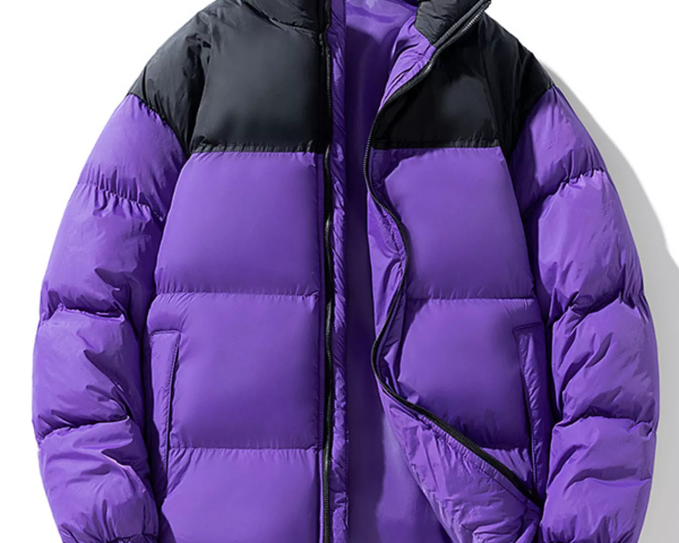 NEWYORKLISTED ATLAS MEN’S COLLECTION: Purple puffer jacket with black collar on a white background