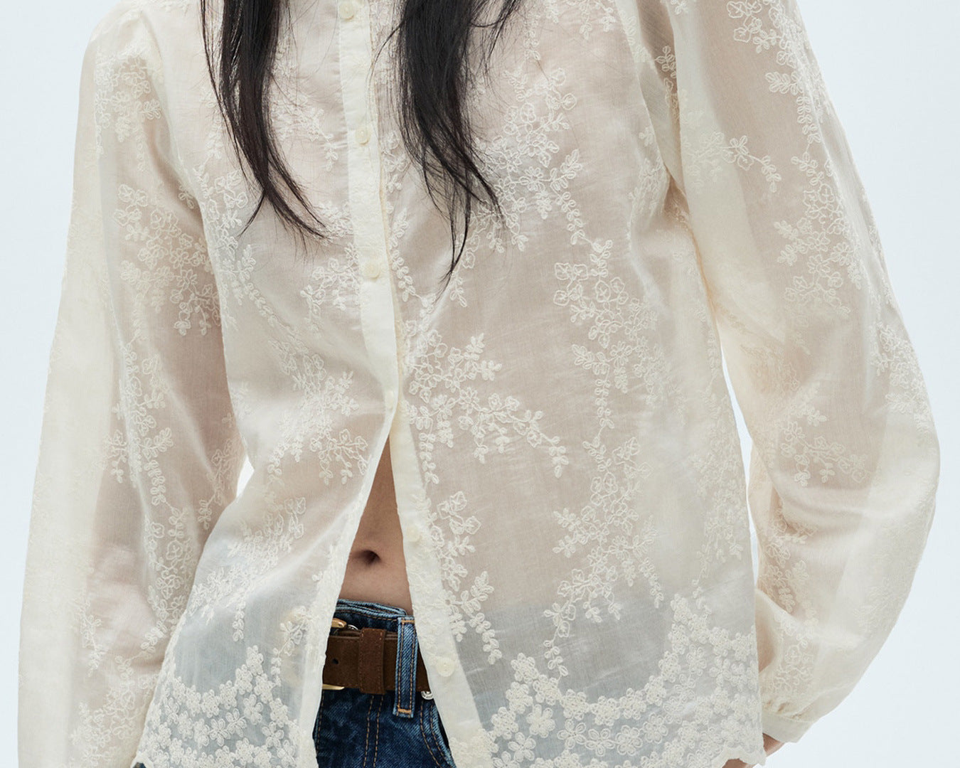 Woman wearing NEWYORKLISTED STYLE COLLECTION lace sheer long sleeve button-front shirt styled as an elegant feminine fashion blouse