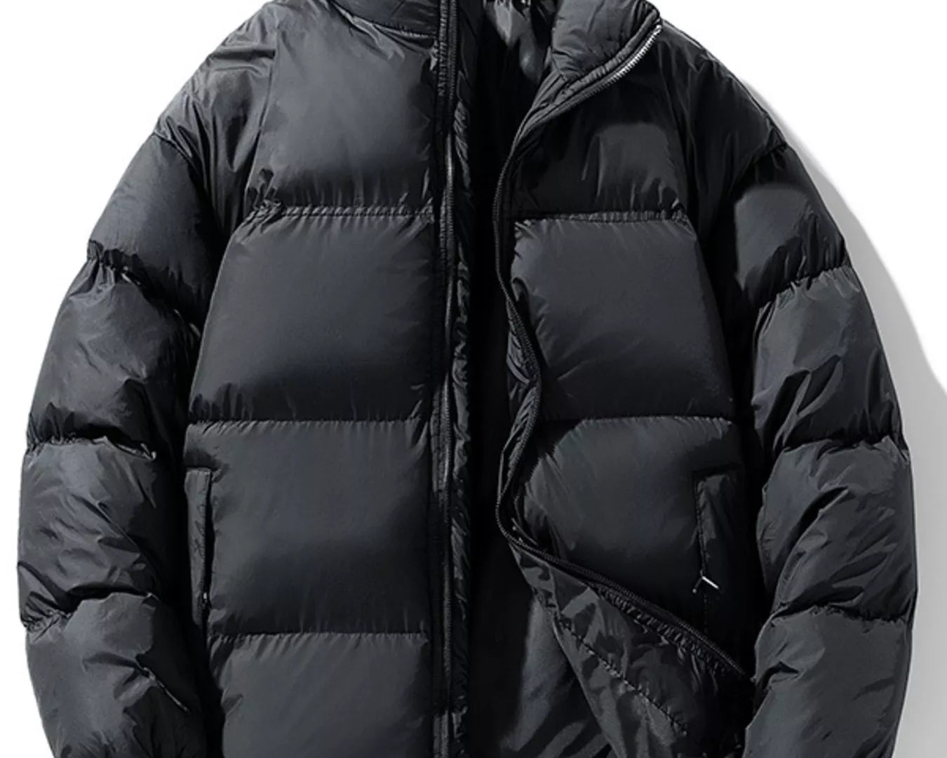 NEWYORKLISTED ATLAS MEN’S COLLECTION: Black puffer jacket on a white background
