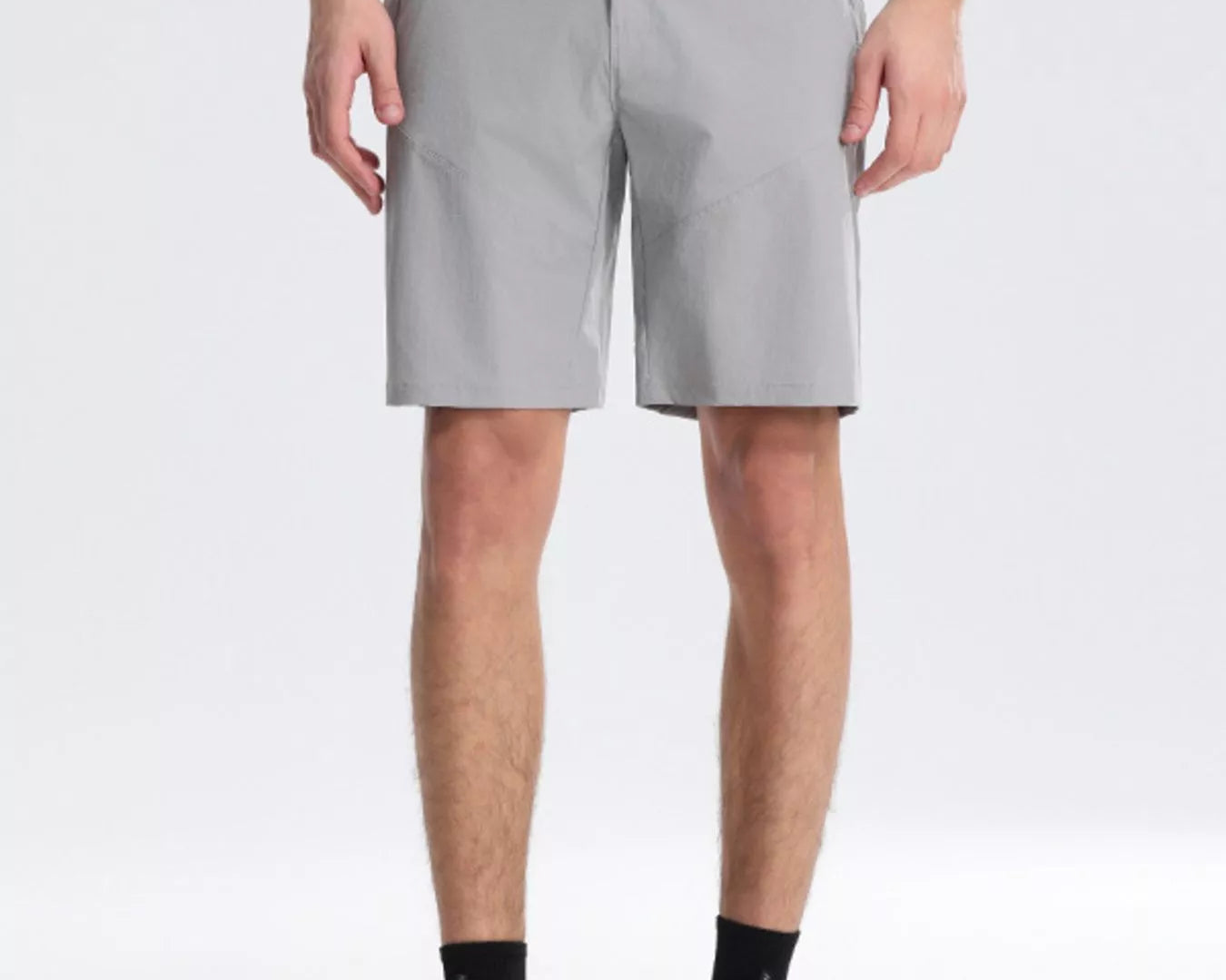 NEWYORKLISTED ATLAS MEN's COLLECTION: Person wearing gray shorts on a white background