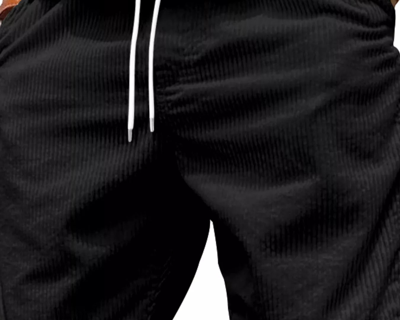 NEWYORKLISTED ATLAS MEN'S COLLECTION: Black shorts with white drawstring on a plain background