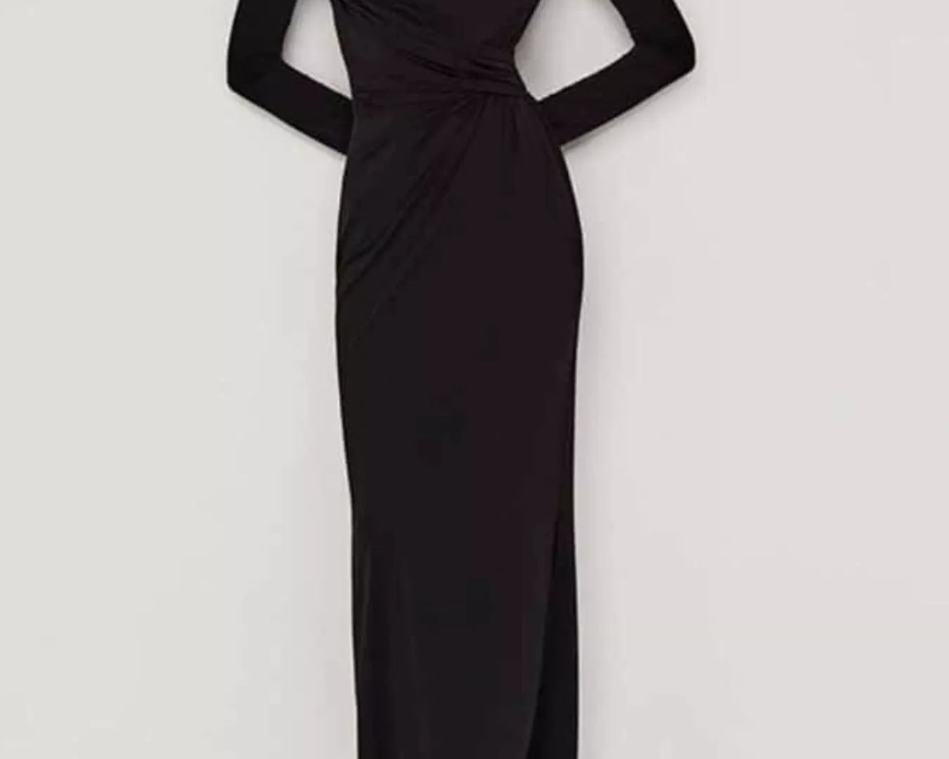 NEWYORKLISTED STYLE COLLECTION: Black evening gown with long sleeves on a white background