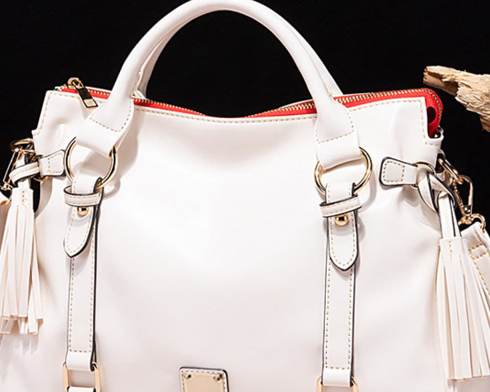 NEWYORKLISTED STYLE COLLECTION: Vegan Leather Handbag with Tassels - NEWYORKLISTED