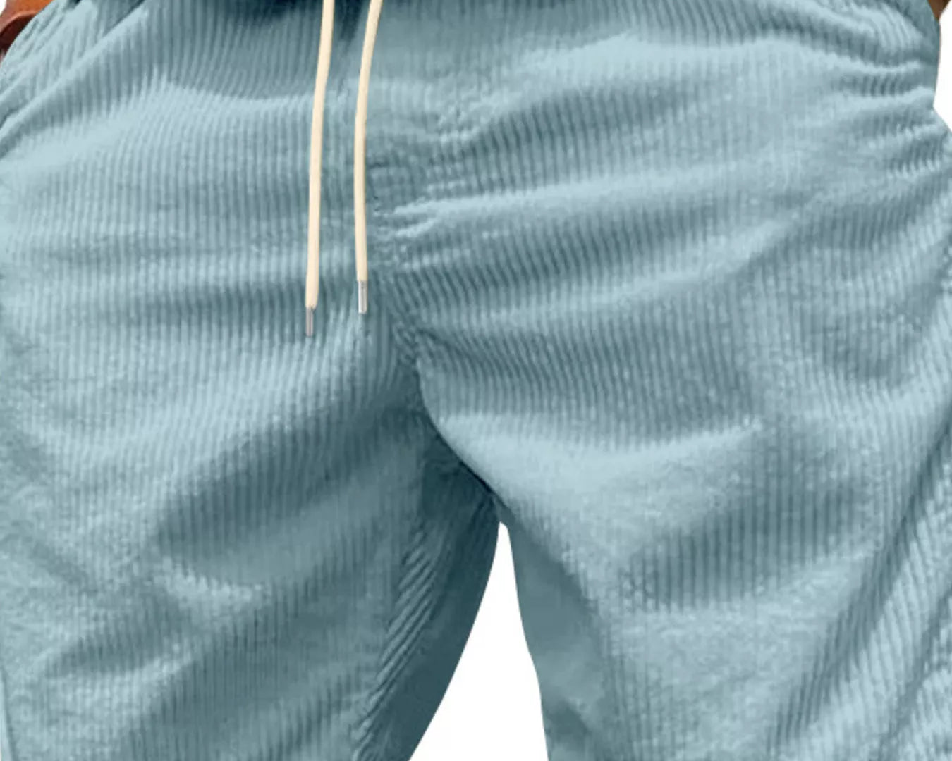 NEWYORKLISTED ATLAS MEN'S COLLECTION: Light blue shorts worn by a person on a white background