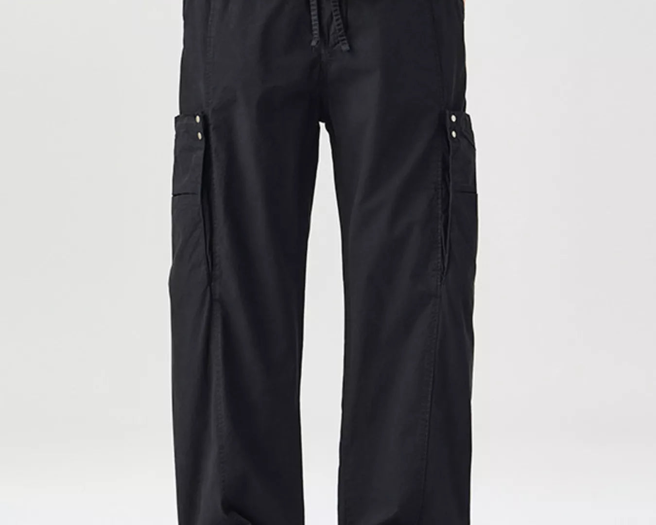 NEWYORKLISTED ATLAS MEN's COLLECTION: Person wearing black cargo pants on a white background