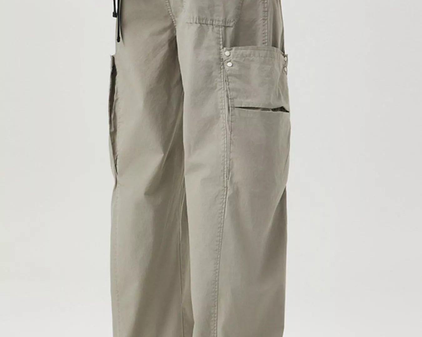 NEWYORKLISTED ATLAS MEN's COLLECTION: Person wearing beige cargo pants on a plain background