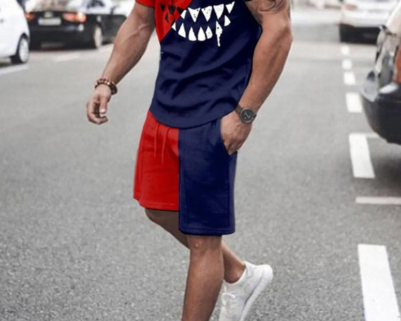 NEWYORKLISTED ATLAS MEN's COLLECTION: Person wearing a red and blue outfit with a shark graphic on a street.