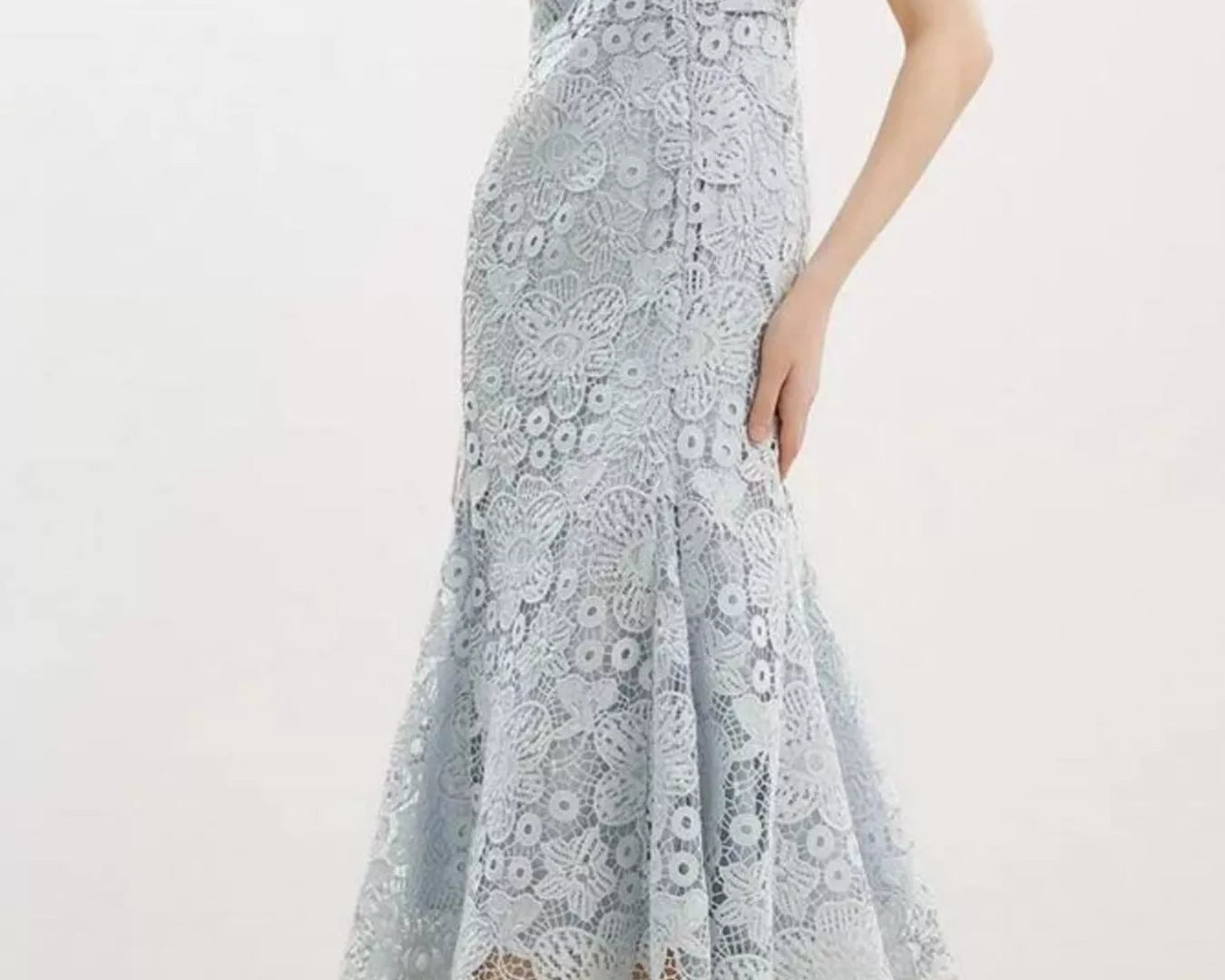 NEWYORKLISTED STYLE COLLECTION: Light blue lace dress on a white background