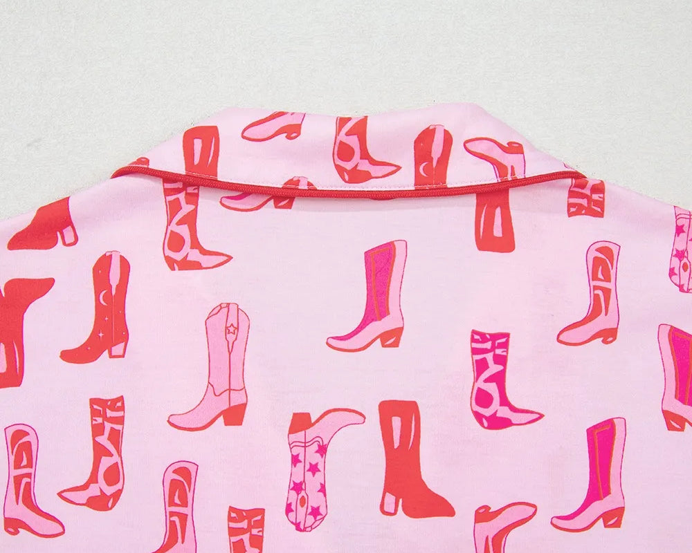 NEWYORKLISTED Intimate Apparel: Pink fabric with red boot pattern on a white background