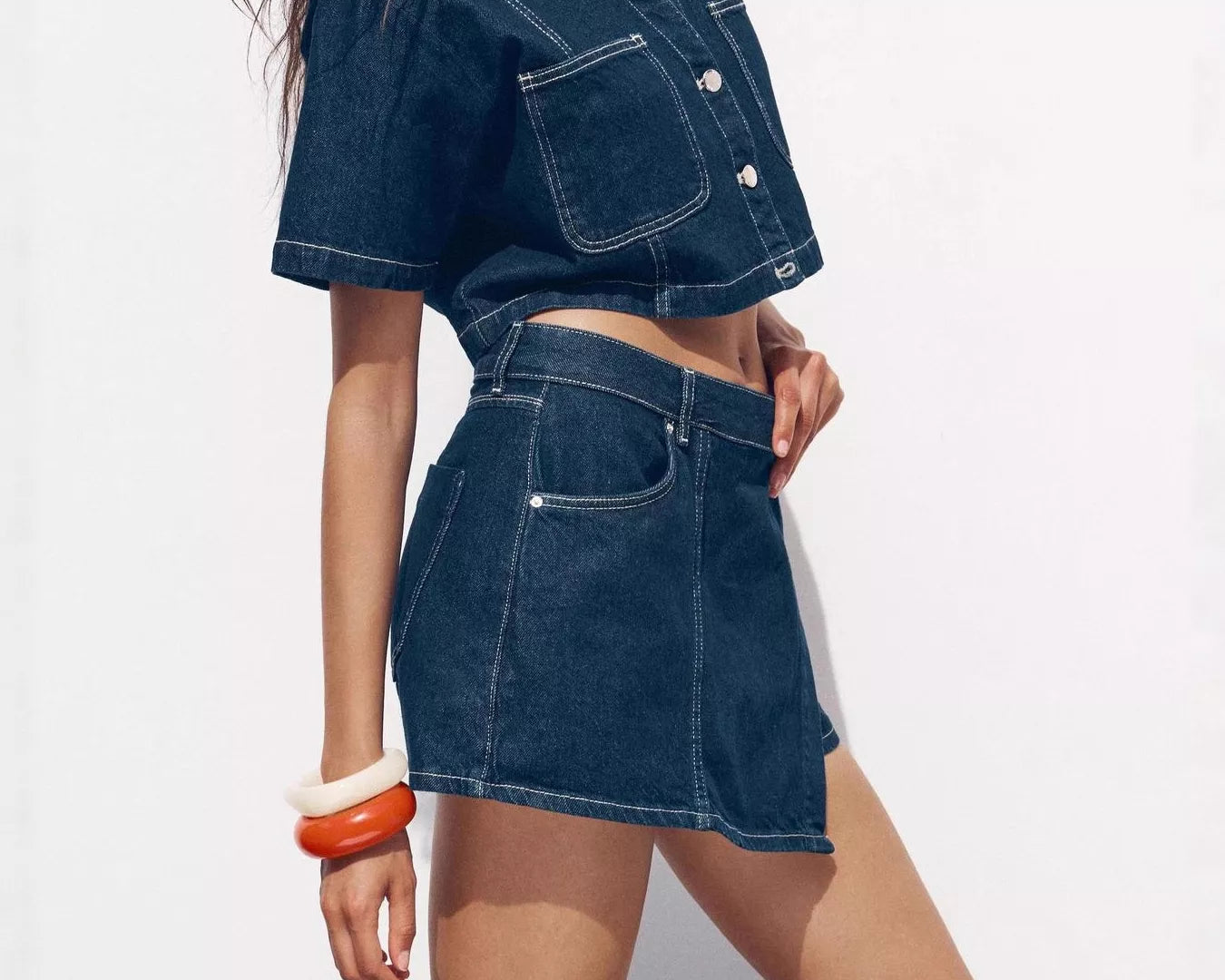 NEWYORKLISTED STYLE COLLECTION: Person wearing a denim outfit on a white background