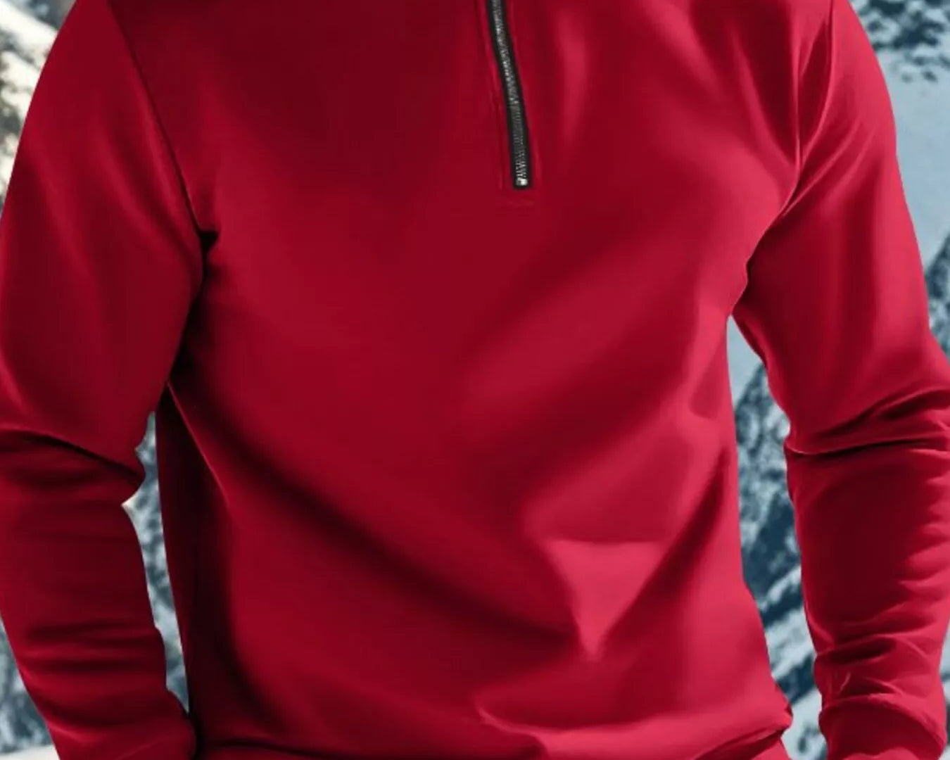 NEWYORKLISTED ATLAS MEN'S COLLECTION: Person wearing a red pullover with a mountainous background