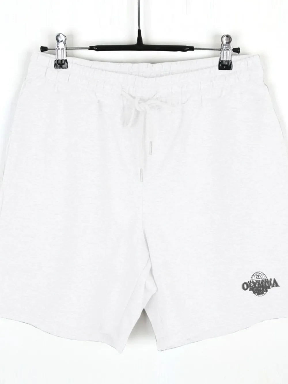 NEWYORKLISTED ATLAS MEN's COLLECTION: White shorts with a brand logo on a white background