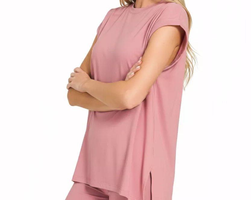 NEWYORKLISTED Comfort Collection: Woman wearing a pink outfit with a plain background