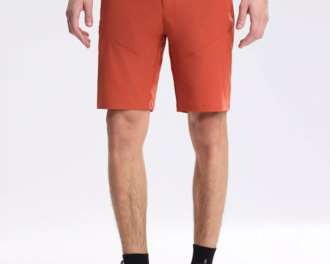 NEWYORKLISTED ATLAS MEN's COLLECTION: Person wearing orange shorts on a white background