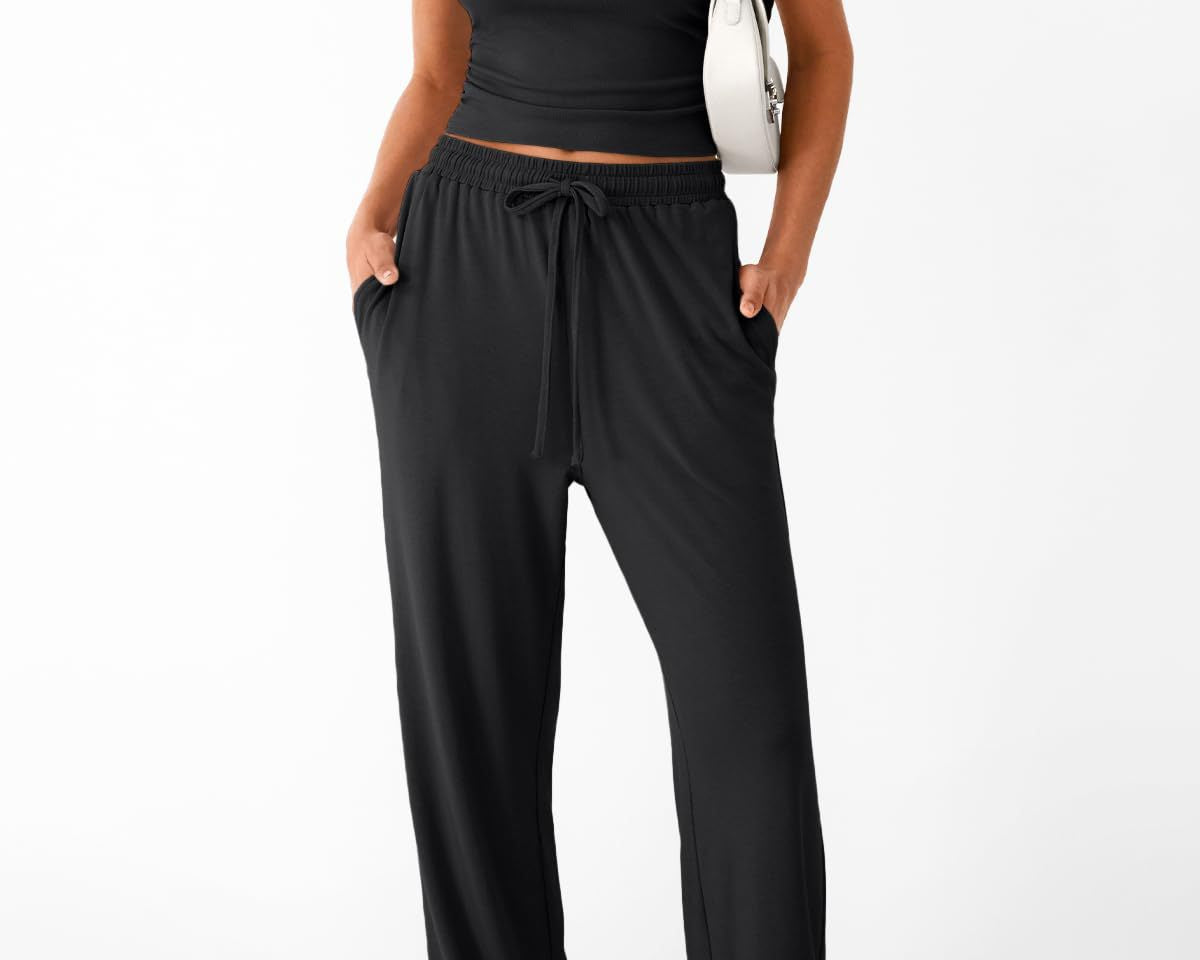NEWYORKLISTED COMFORT COLLECTION: Woman wearing a black outfit with a white background