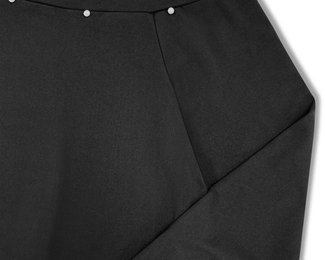 NEWYORKLISTED STYLE COLLECTION: Black pants with a pleated design on a white background