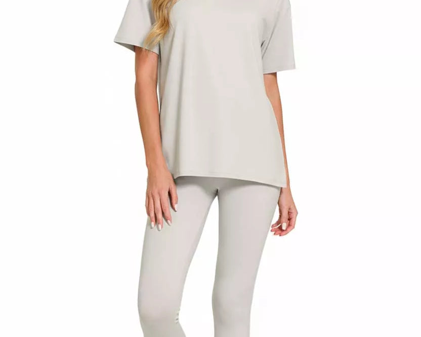 NEWYORKLISTED COMFORT COLLECTION: Model wearing a light gray t-shirt and leggings on a white background