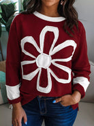 NEWYORKLISTED STYLE COLLECTION – Flower Patched Round Neck Long Sleeve Top | Casual Chic Everyday Style | Soft Stretch Knit: Person wearing a maroon sweater with a large white flower design.