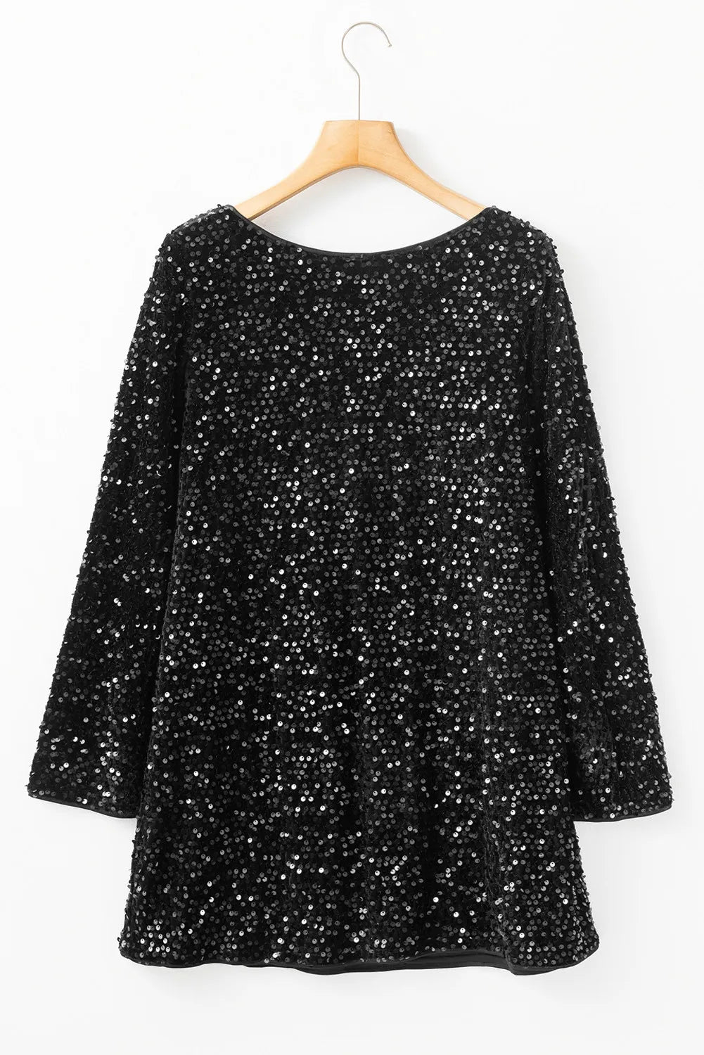 NEWYORKLISTED Valentine's Day Specials: Black sequin dress on a wooden hanger against a white background
