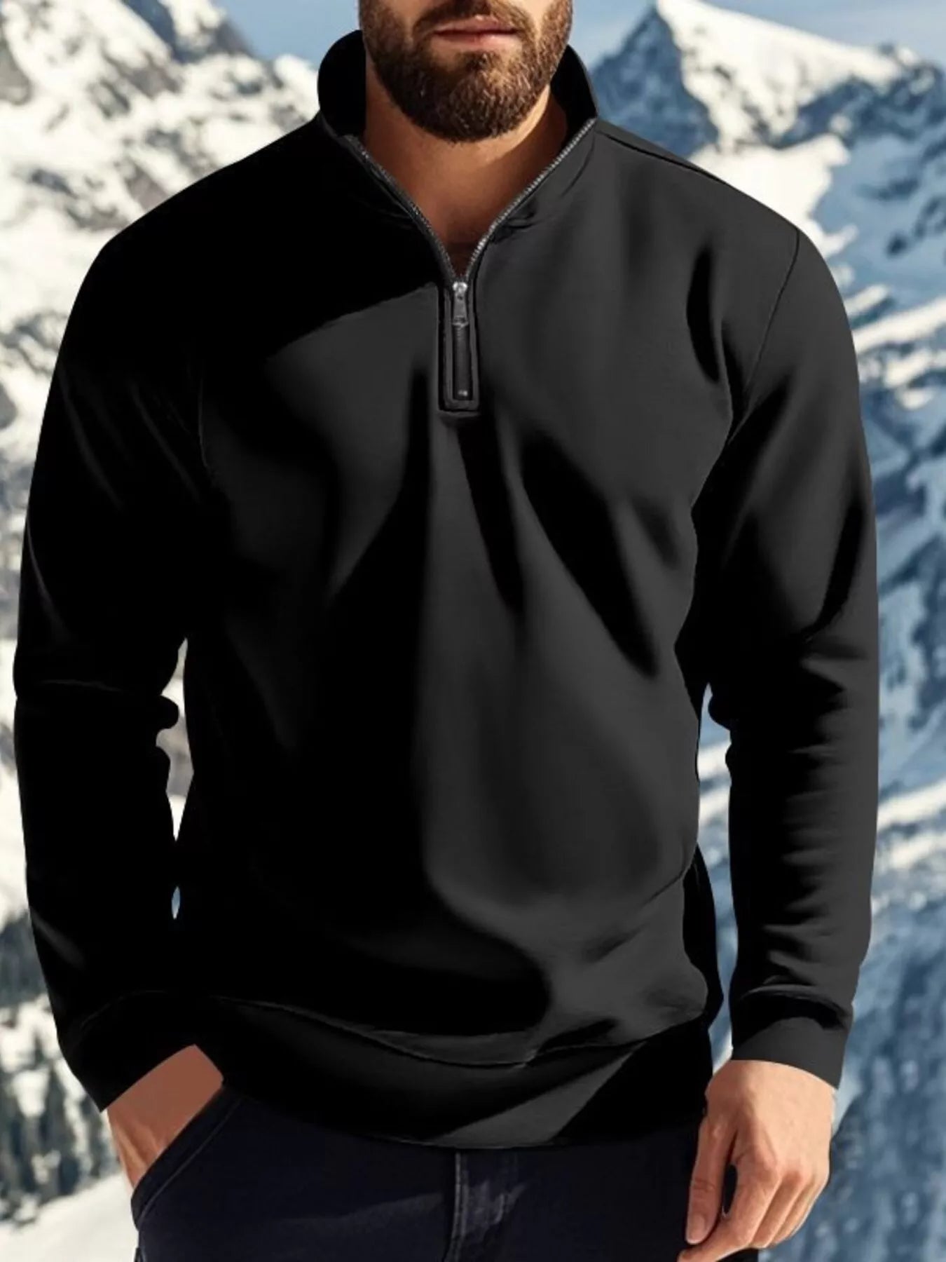 NEWYORKLISTED ATLAS MEN'S COLLECTION: Person wearing a black quarter-zip sweatshirt with a mountainous background