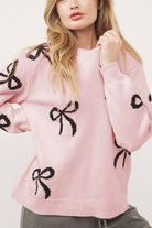 NEWYORKLISTED STYLE COLLECTION: Bow Pattern Round Neck Loose Fit Sweater in Blush Pink 