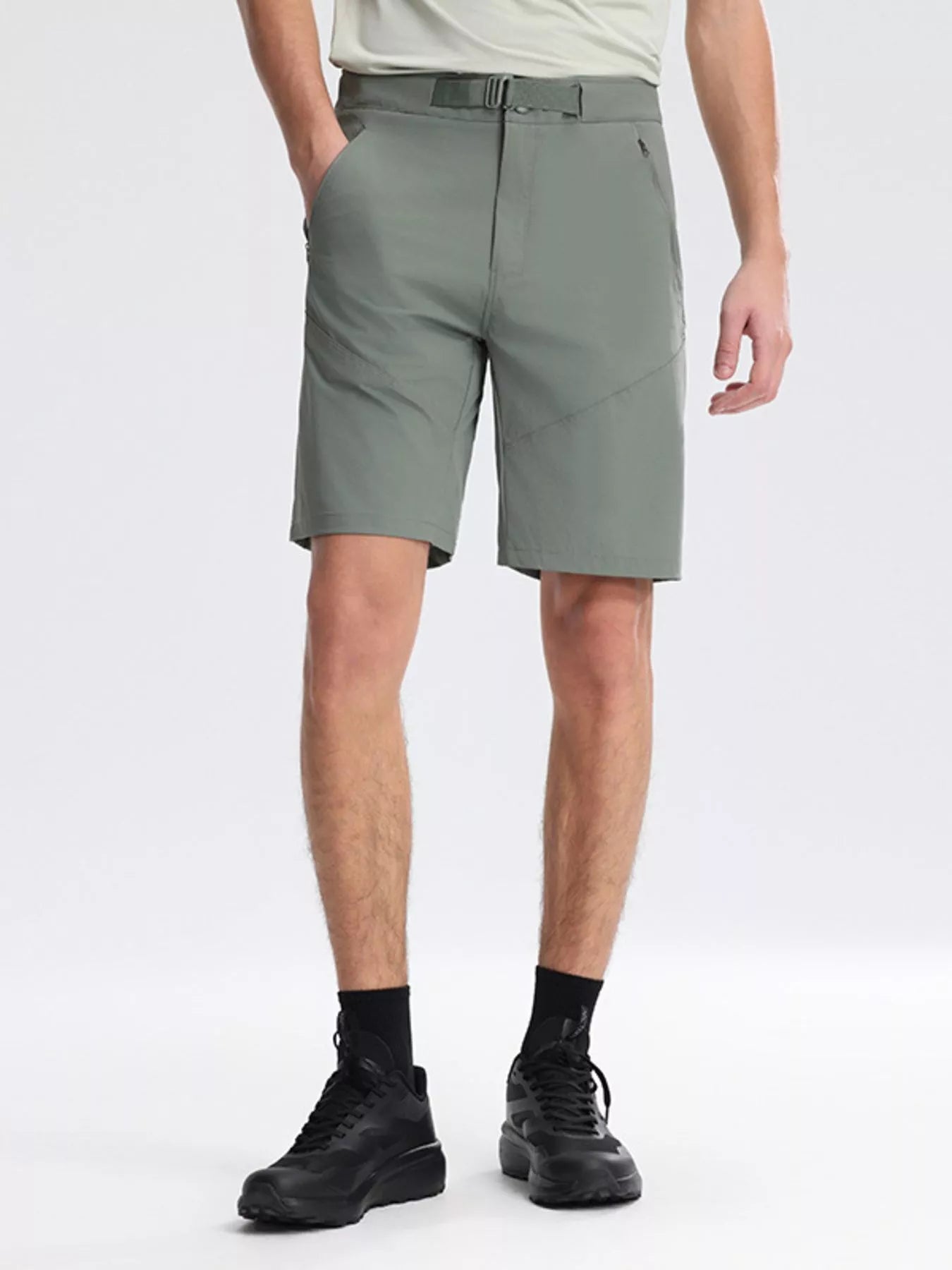 NEWYORKLISTED ATLAS MEN's COLLECTION: Person wearing green shorts on a white background