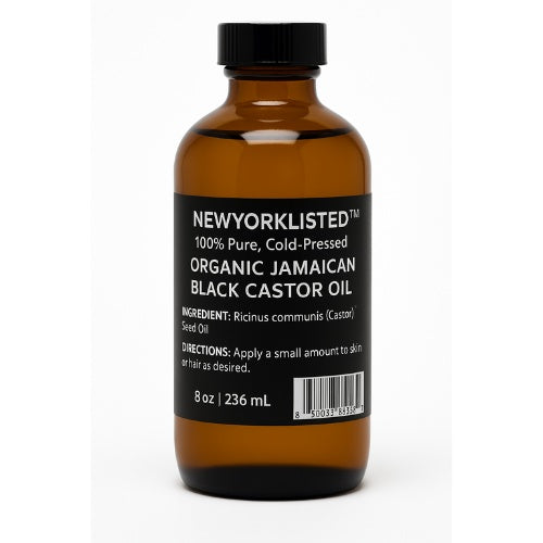 Brown glass bottle of Newyorklisted Organic Jamaican Black Castor Oil on a white background