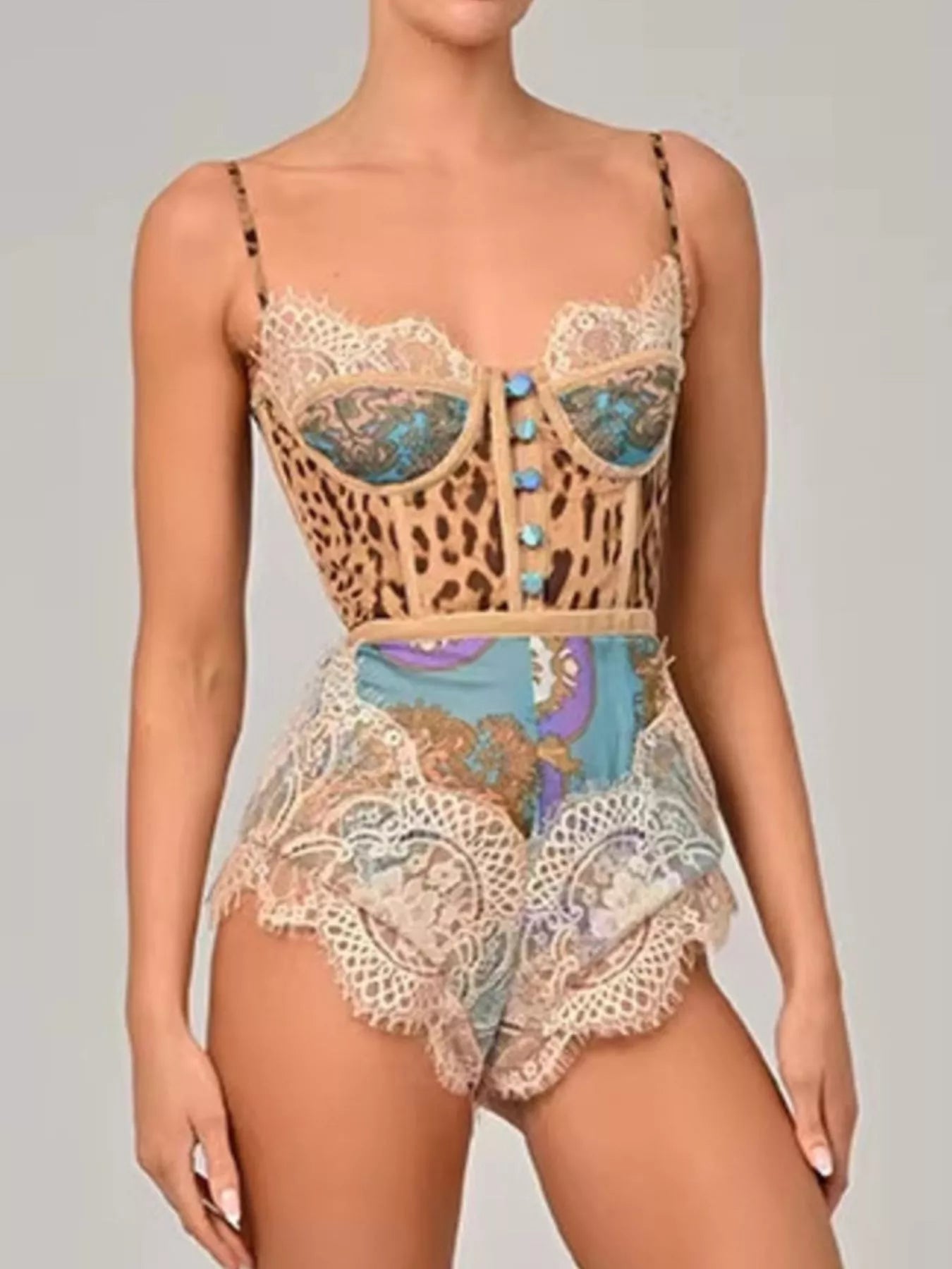 NEWYORKLISTED INTIMATE APPAREL: Lace and leopard print top with matching shorts on a neutral background