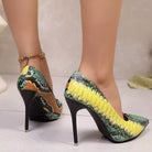 NEWYORKLISTED SHOE COLLECTION: High-heeled shoes with snake print design on a neutral background