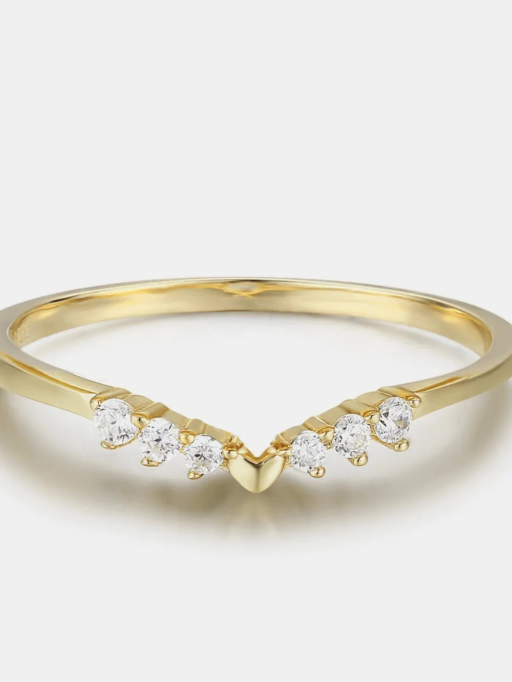 NEWYORKLISTED Valentine's Day Specials: Gold ring with small diamonds on a light background