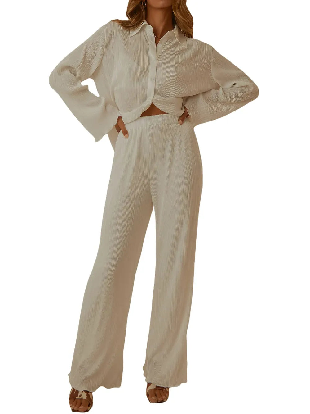 NEWYORKLISTED Intimate Apparel Collection: Beige outfit with a shirt and pants on a white background