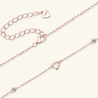 NEWYORKLISTED Valentine’s Day Specials: Rose gold anklets with heart-shaped clasp on a white background