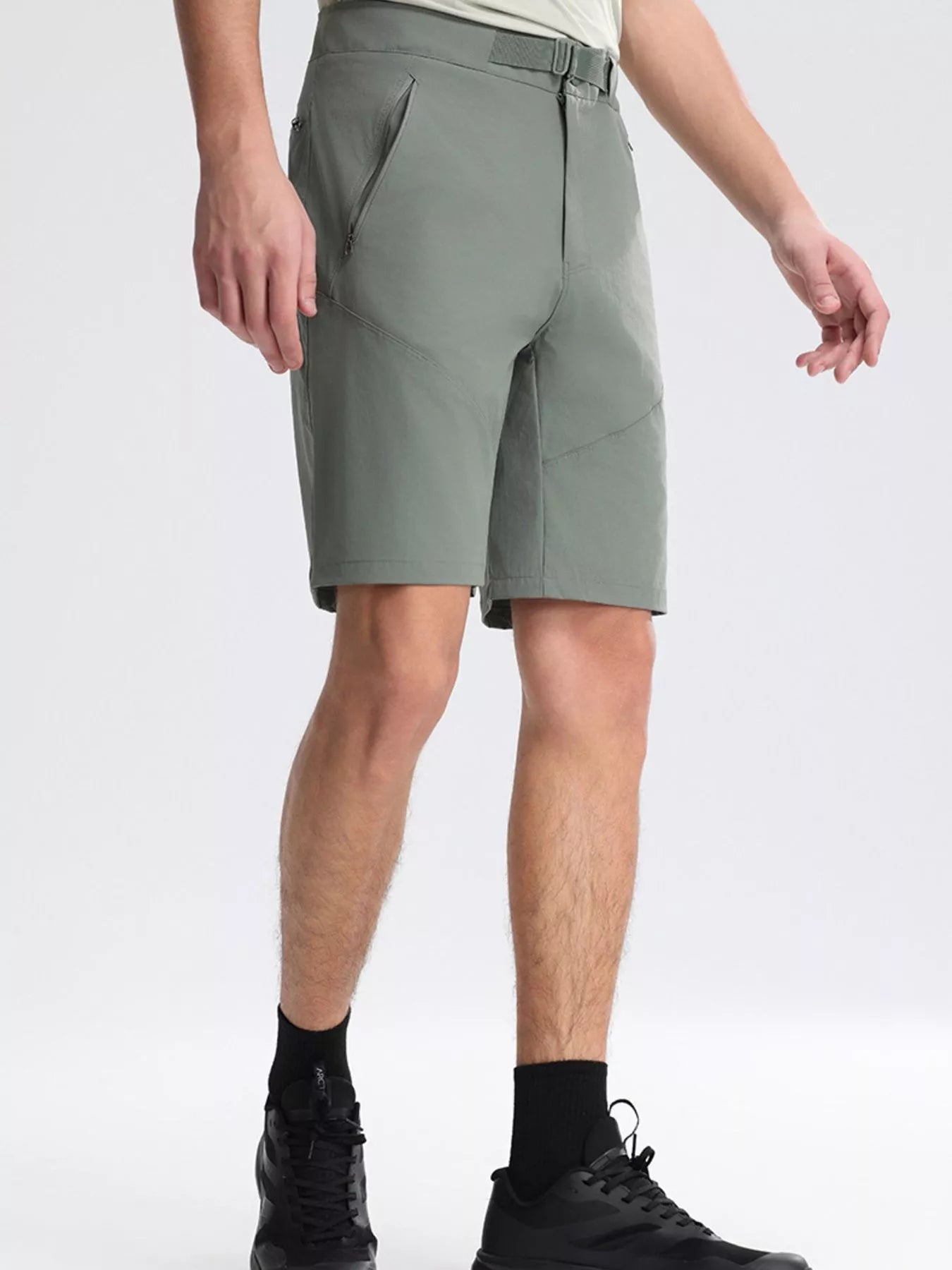 NEWYORKLISTED ATLAS MEN's COLLECTION: Person wearing green shorts on a white background