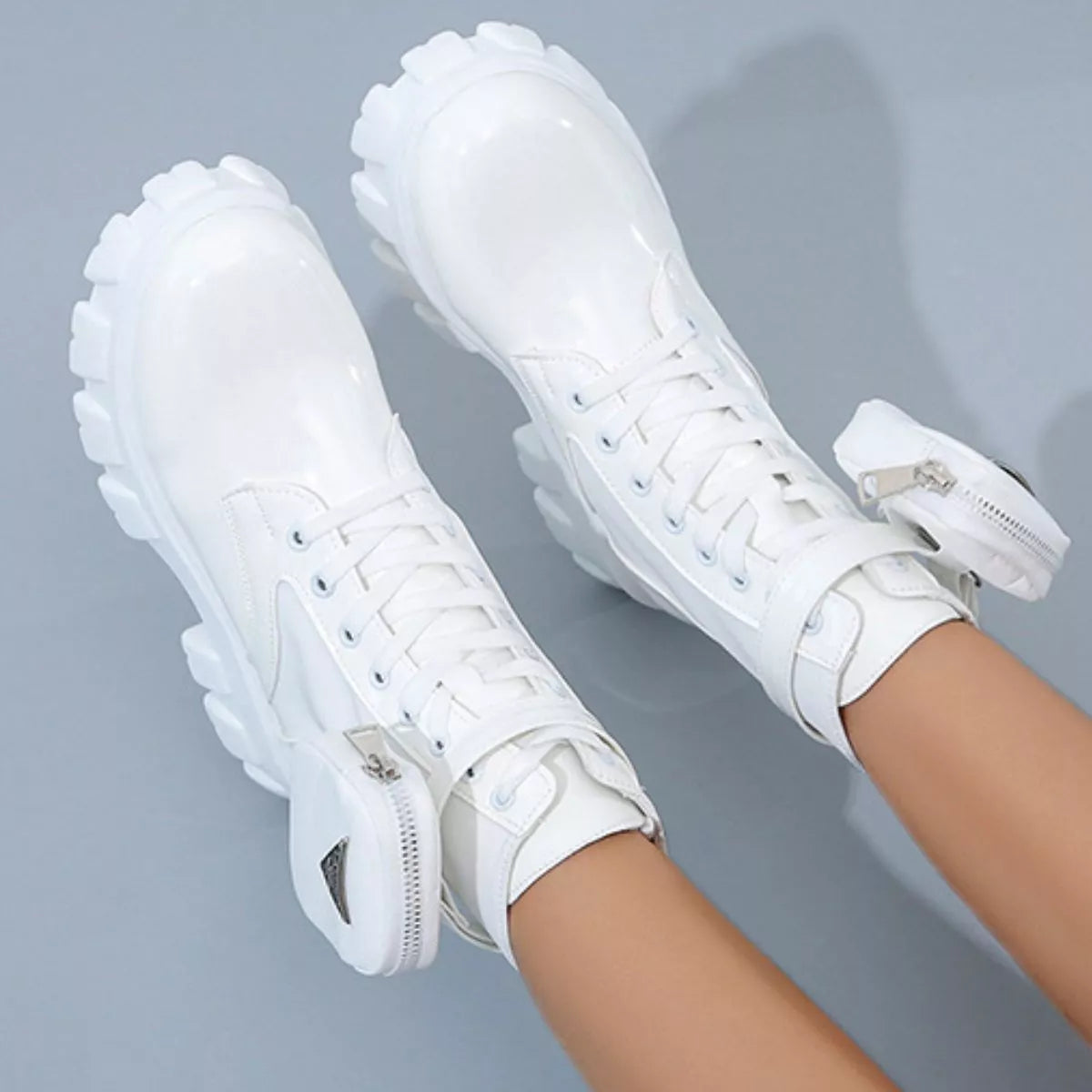 NEWYORKLISTED SHOE COLLECTION: White high-top sneakers with transparent soles on a gray background