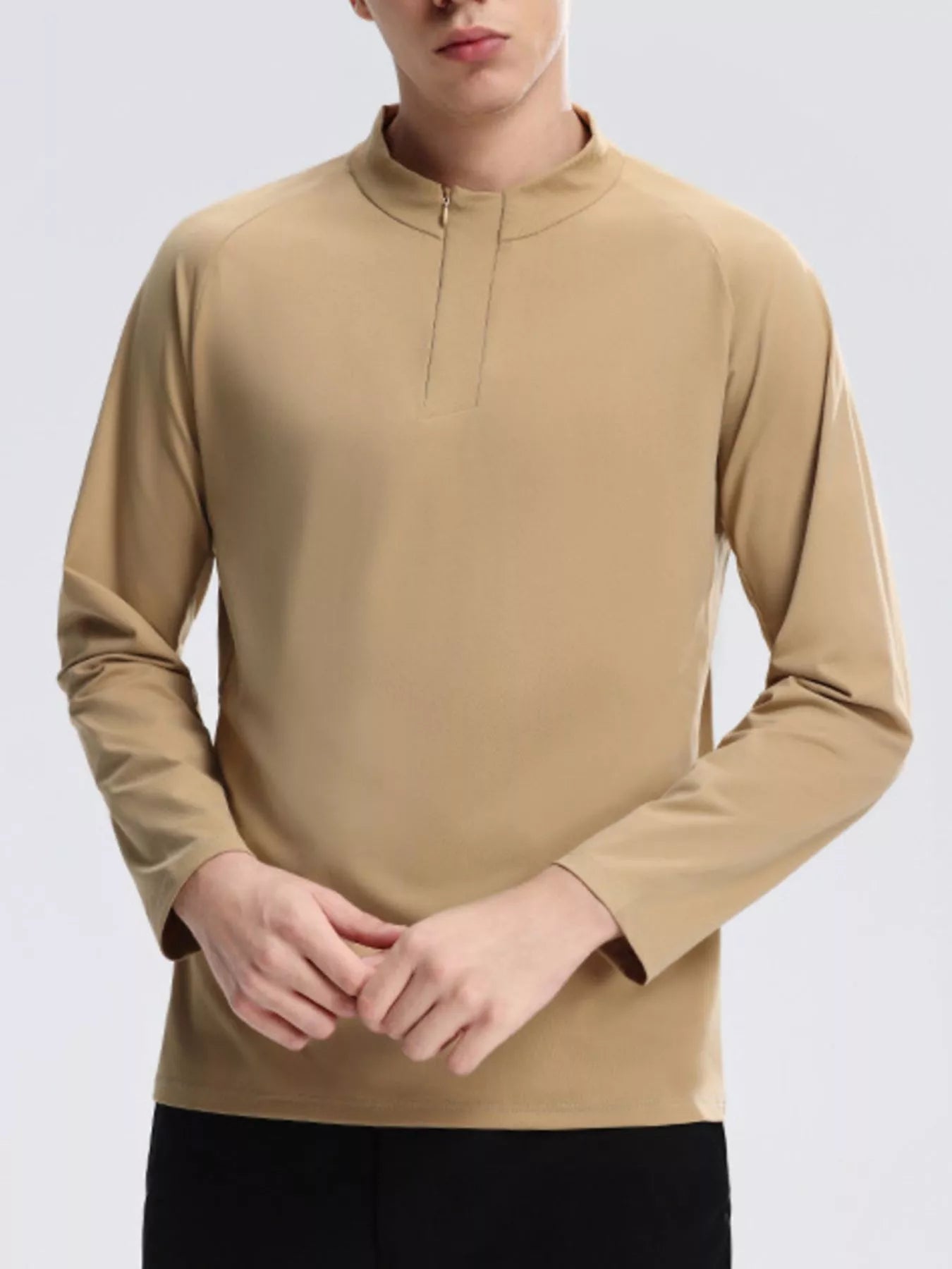 NEWYORKLISTED ATLAS MEN's COLLECTION: Beige long-sleeve shirt worn by a person on a light gray background