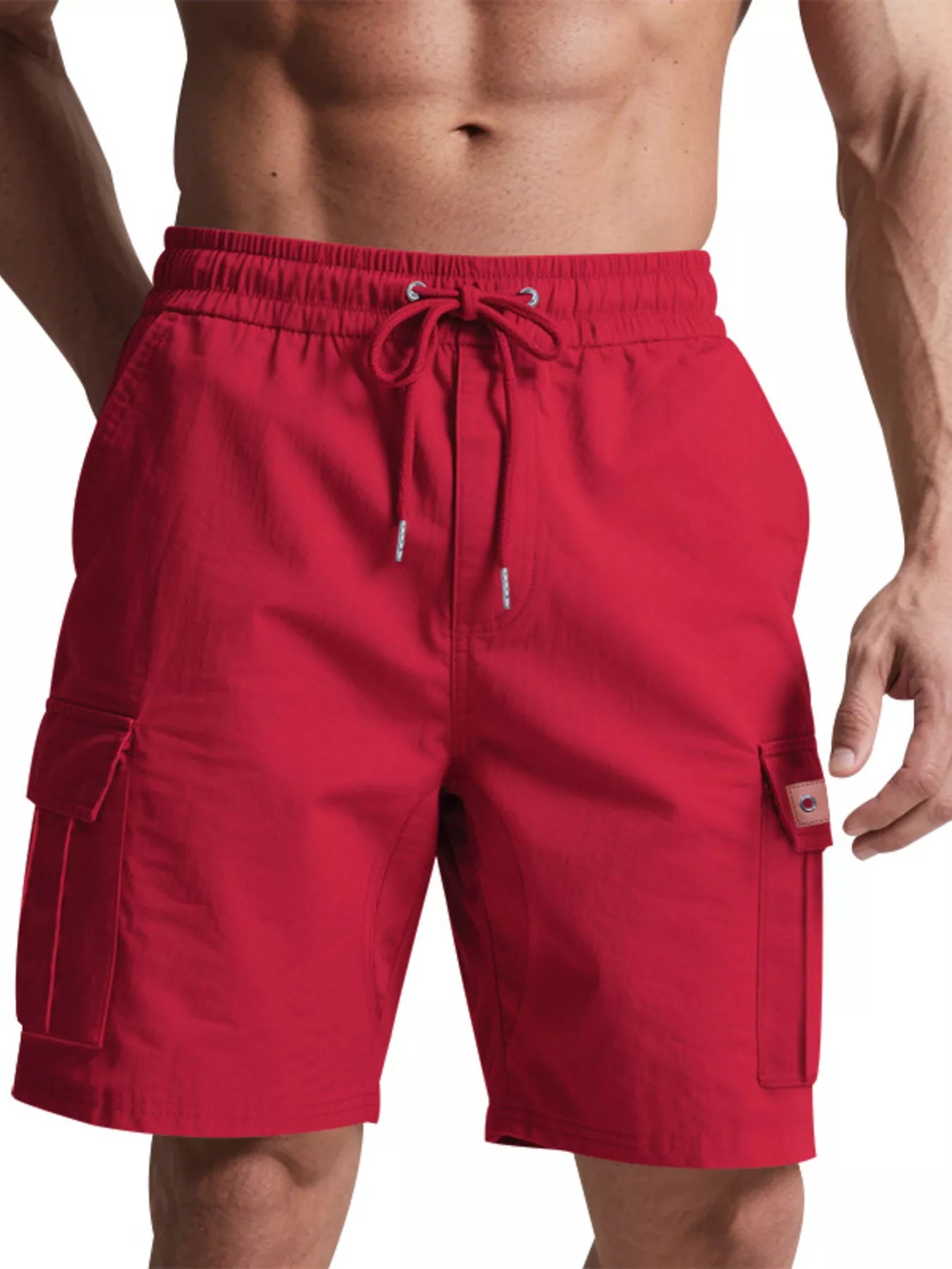 NEWYORKLISTED ATLAS MEN'S COLLECTION: Red cargo shorts worn by a person on a white background