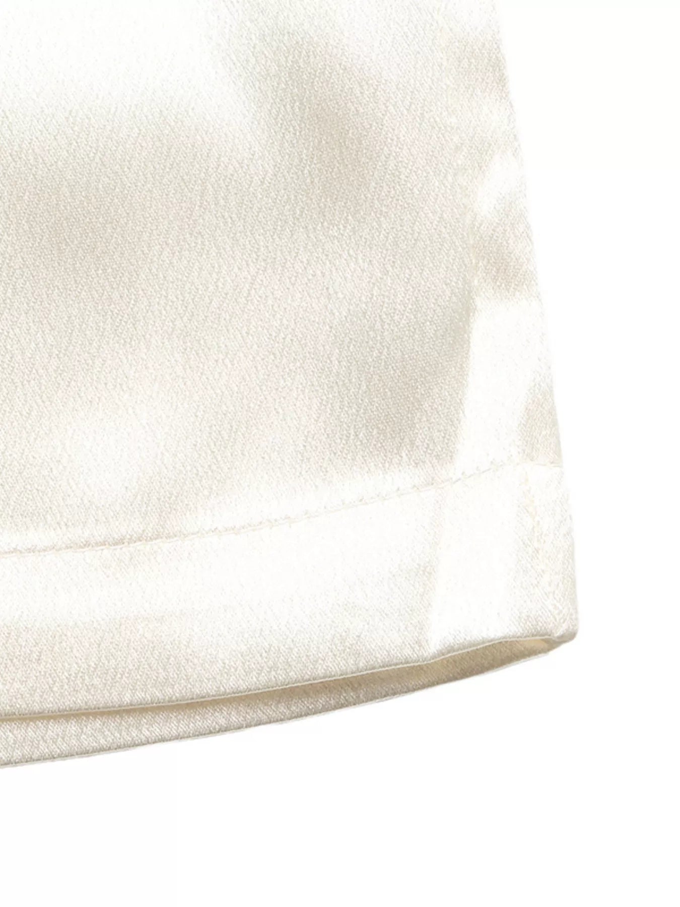 NEWYORKLISTED STYLE COLLECTION: Close-up of a textured white fabric surface