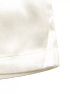 NEWYORKLISTED STYLE COLLECTION: Close-up of a textured white fabric surface