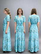 NEWYORKLISTED STYLE COLLECTION: Woman wearing a blue floral dress from front, side, and back views on a gray background