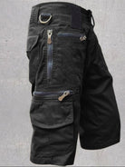 NEWYORKLISTED ATLAS MEN'S COLLECTION: Black tactical shorts with multiple pockets and zippers on a gray background