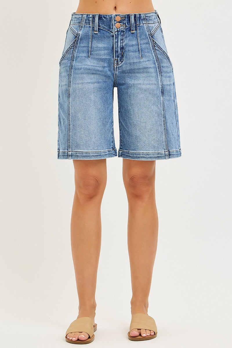 NEWYORKLISTED STYLE COLLECTION: Denim shorts worn by a person on a white background