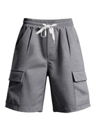 NEWYORKLISTED ATLAS MEN'S COLLECTION: Gray cargo shorts with pockets and a drawstring on a white background