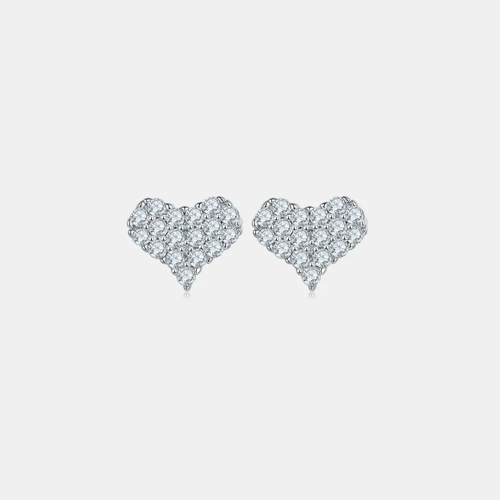 NYLD Glamour Collection By NEWYORKLISTED: Heart-shaped diamond earrings on a light gray background