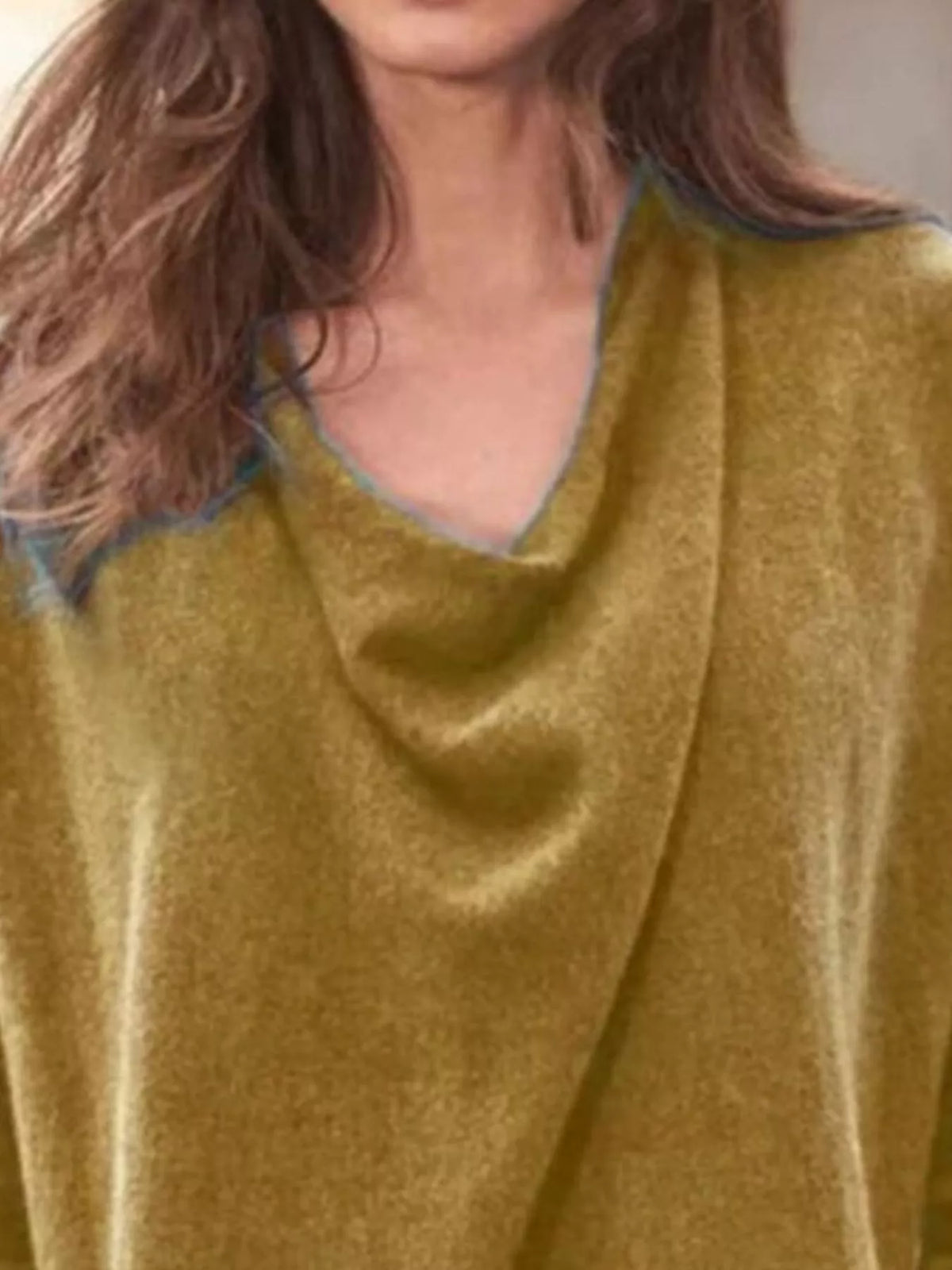 NEWYORKLISTED STYLE COLLECTION: Close-up of a mustard yellow sweater with a textured pattern
