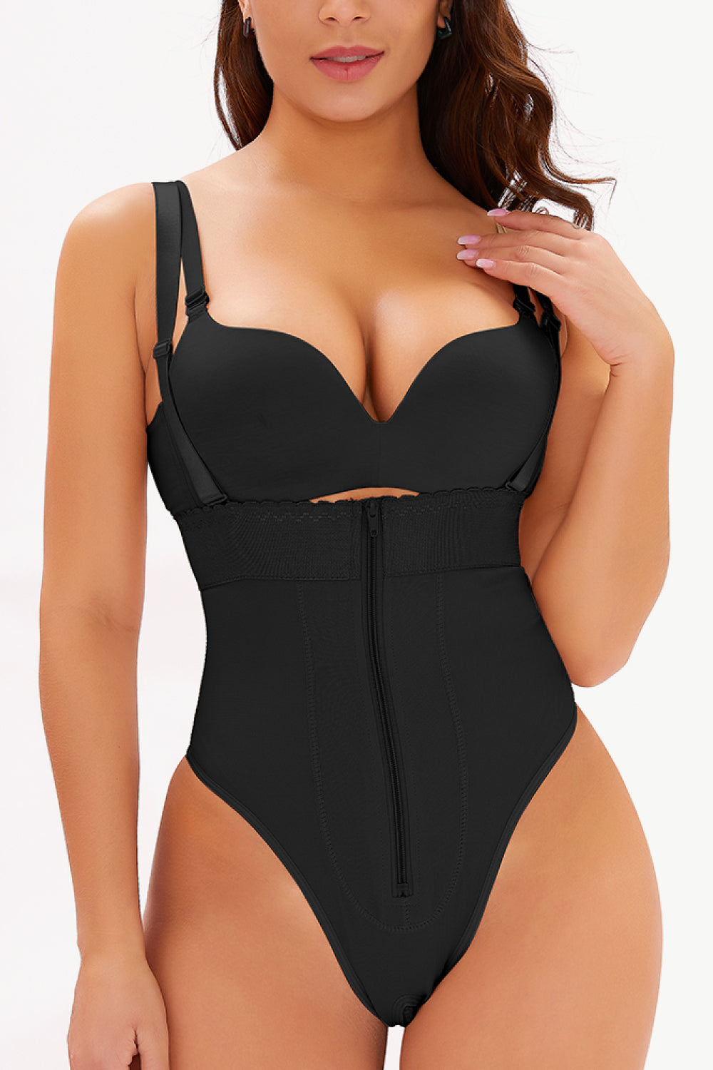 NEWYORKLISTED Intimate Apparel: Black swimsuit worn by a model on a white background