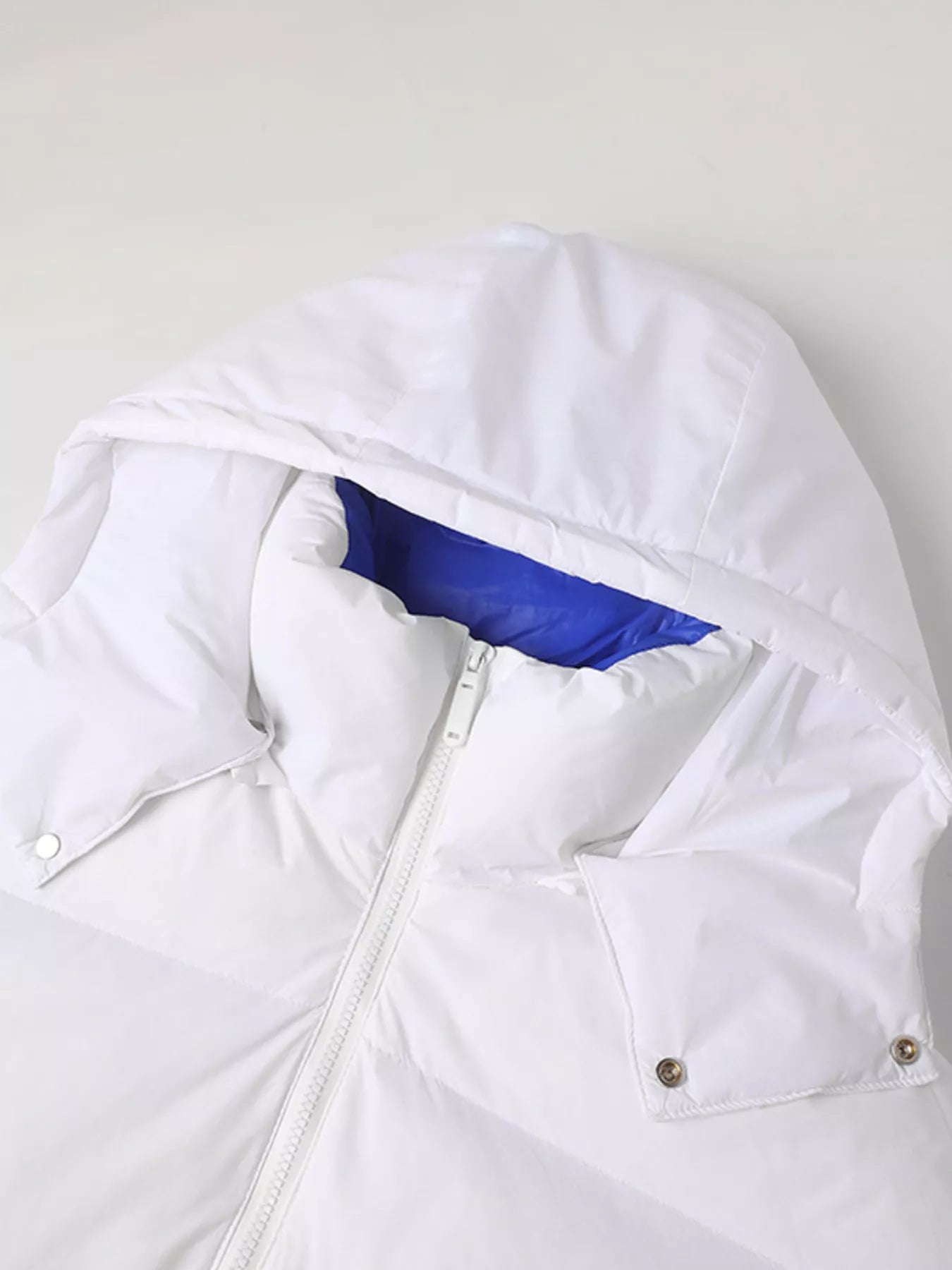 NEWYORKLISTED ATLAS MEN’S COLLECTION: White jacket with blue lining on a white background
