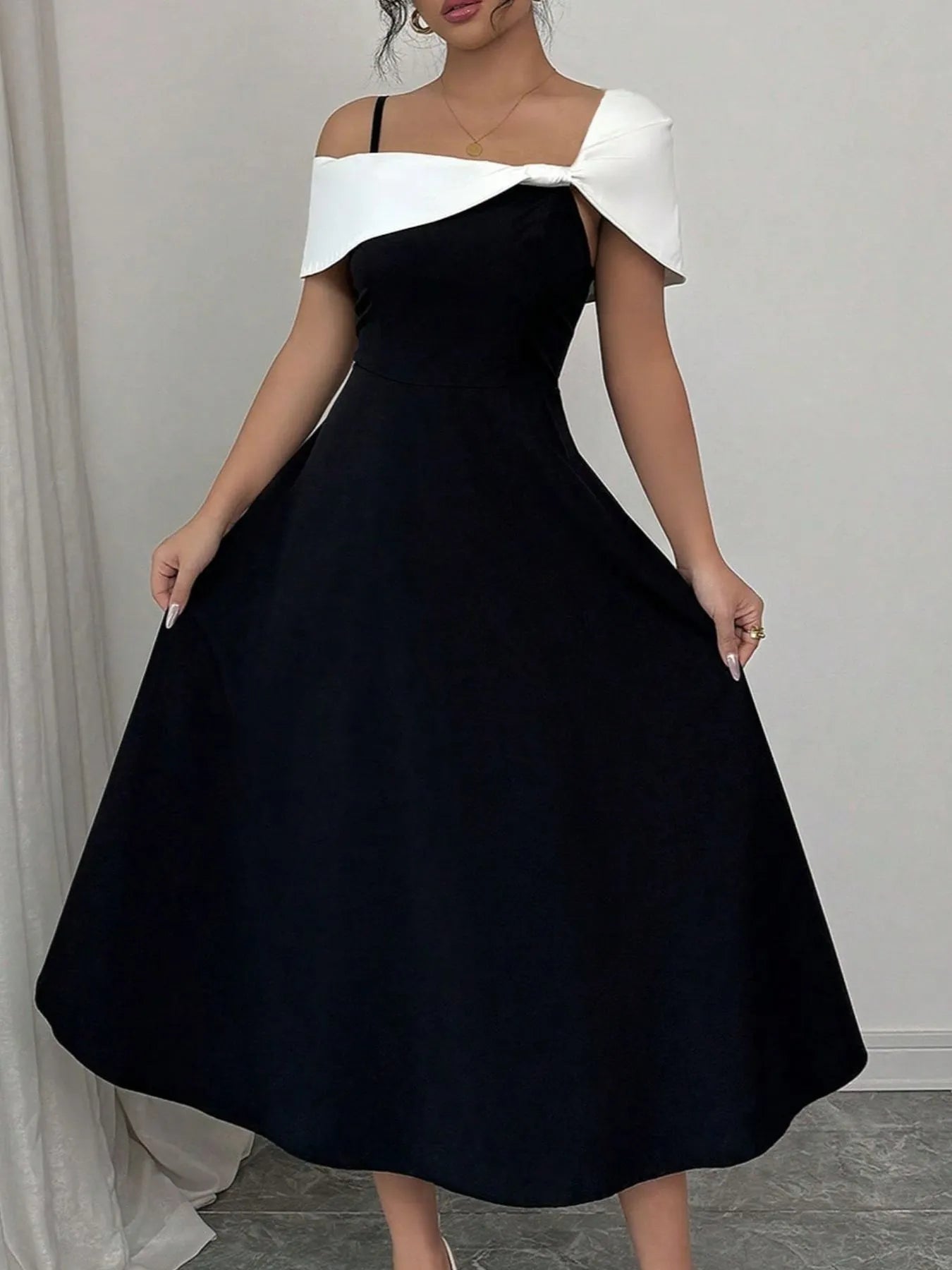 NEWYORKLISTED STYLE COLLECTION: Asymmetrical Neck Contrast Midi Dress – Bold, Sleek & Sophisticated